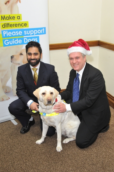 MP gets a visit from Guide Dog's Santa Paws this Christmas