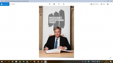 Henry Smith MP signs Holocaust Educational Trust Book of Commitment