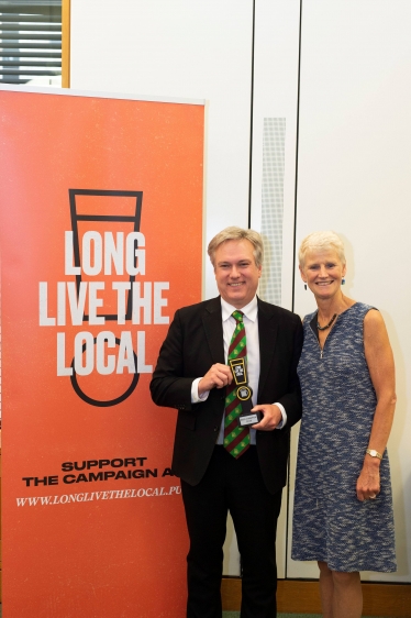 Henry Smith MP presented with Beer Champion award for work campaigning for pubs 